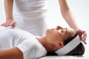 Woman at reiki session.